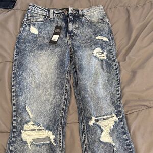 distressed dark blue boyfriend jeans